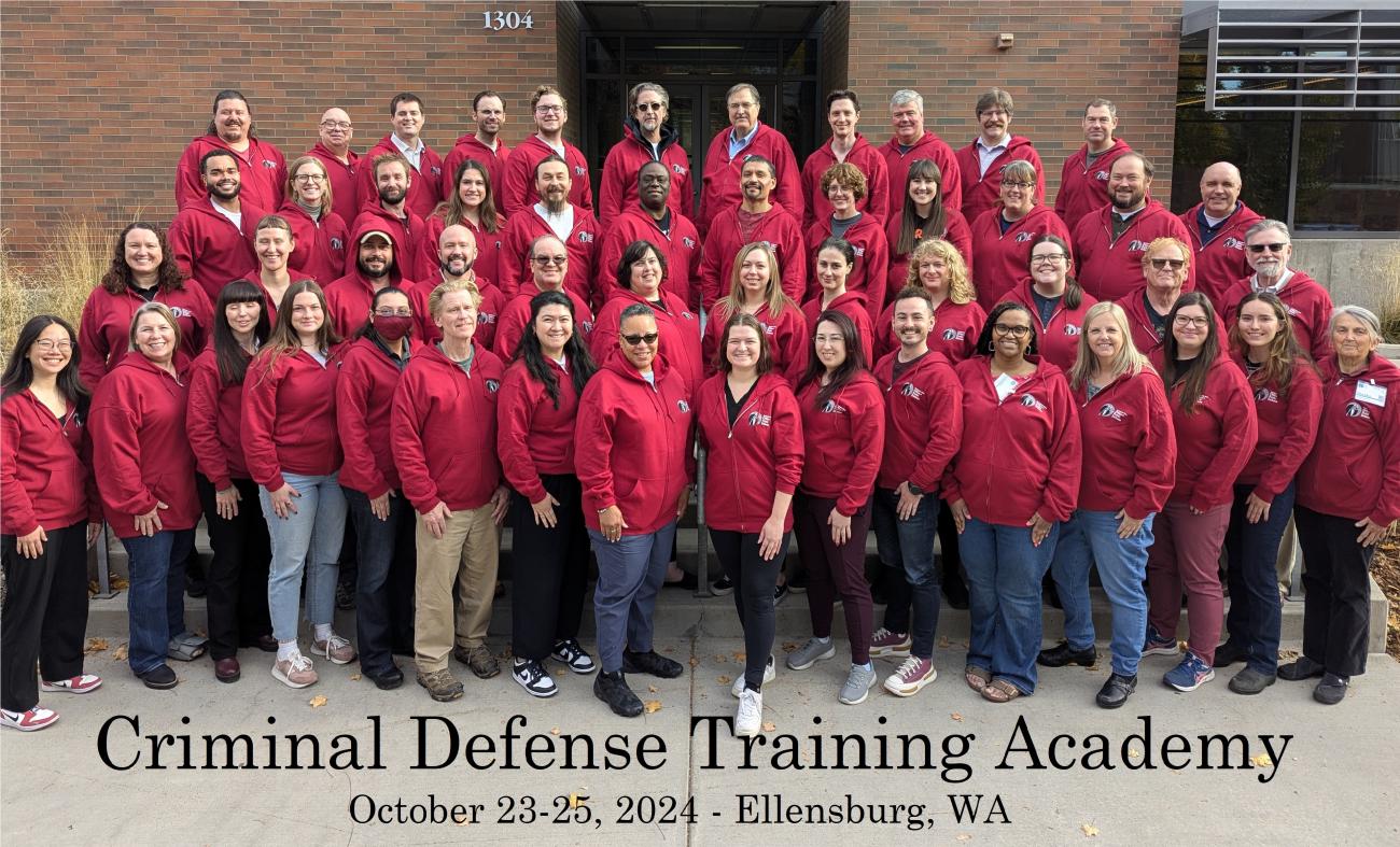 Group photo of Criminal Defense training academy graduates on the steps at Central Washington Univeristy