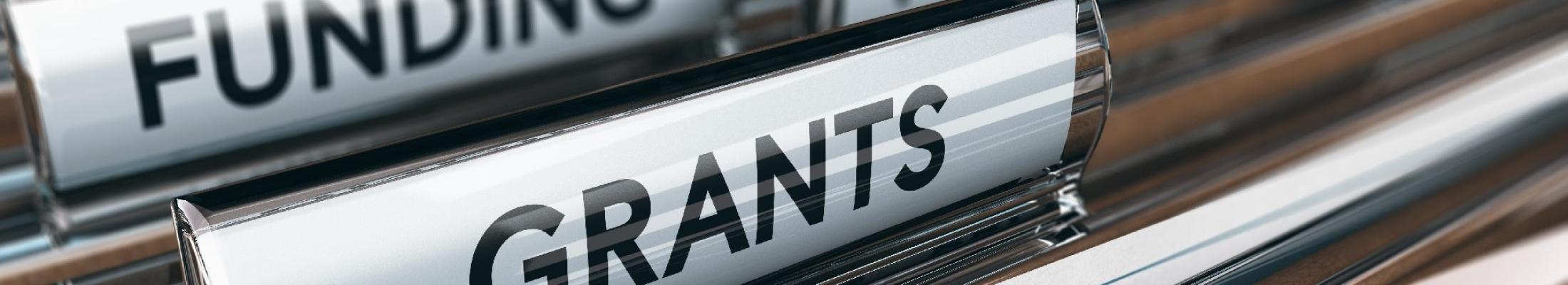 Folder tabs that say Funding and Grants